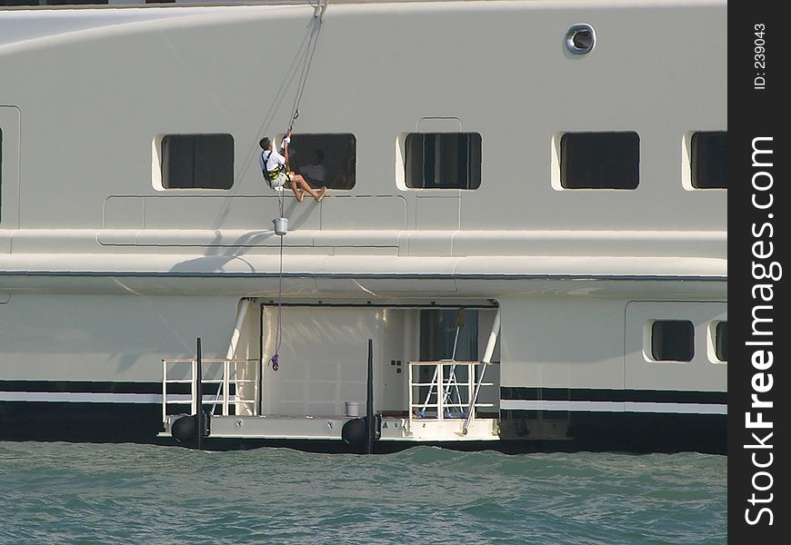 Boat window cleaner dangerous job