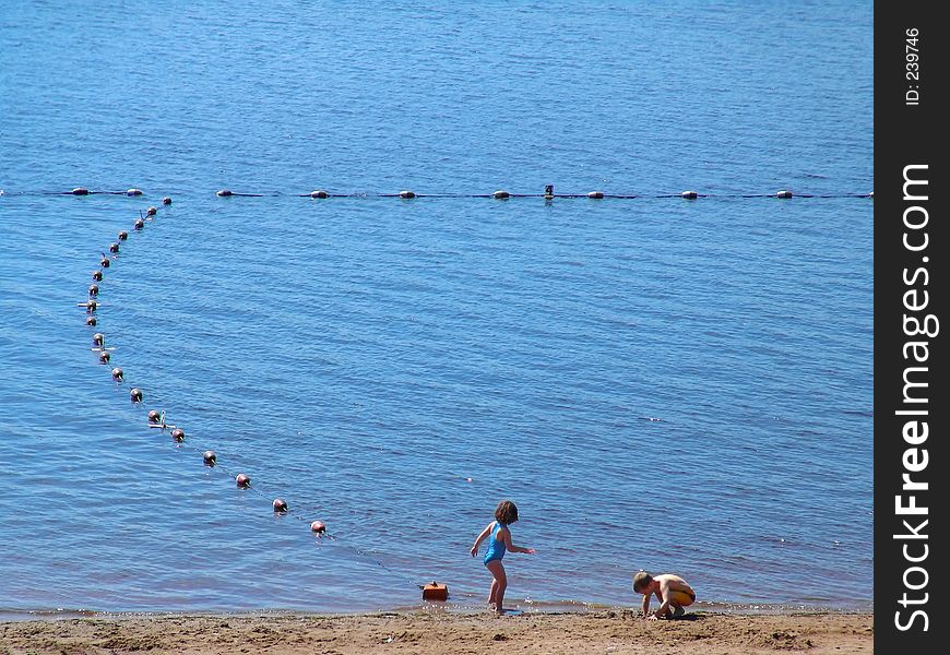 Children playing on the lake
