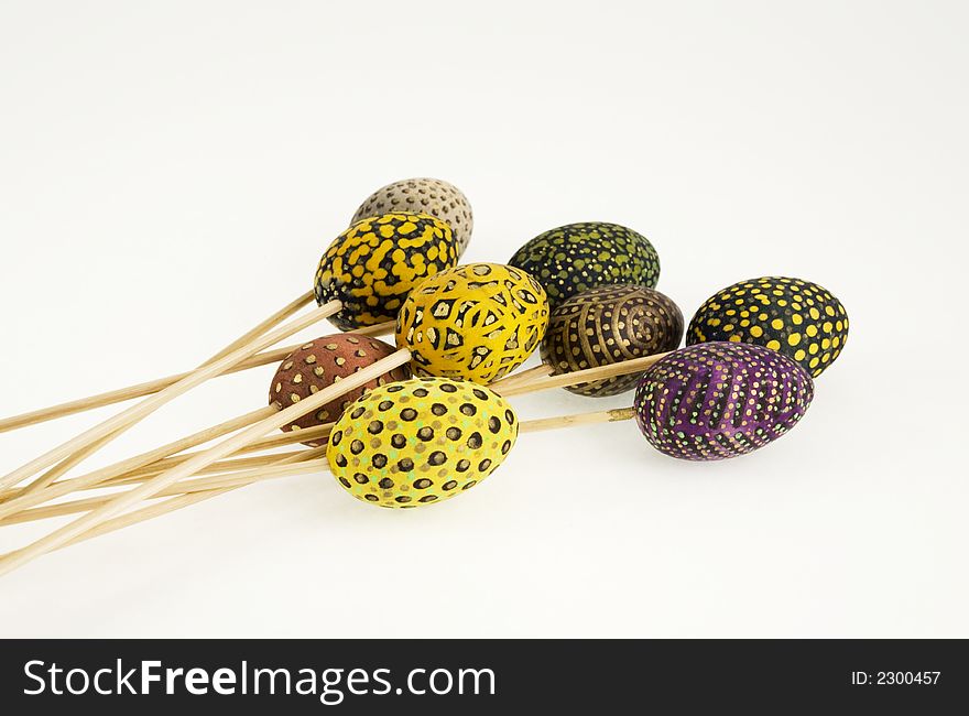 Hand painted eggs on wooden sticks. Hand painted eggs on wooden sticks
