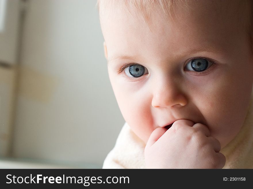 Cute little girl in the light of sun