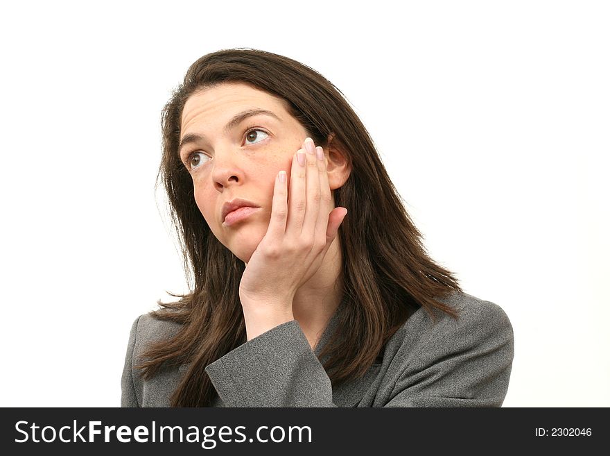 Thinking business woman in a suit isolated over white background