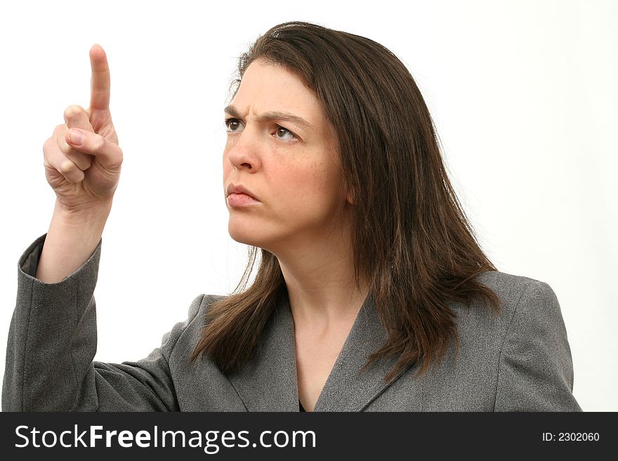 Frowning business woman with pointing finger