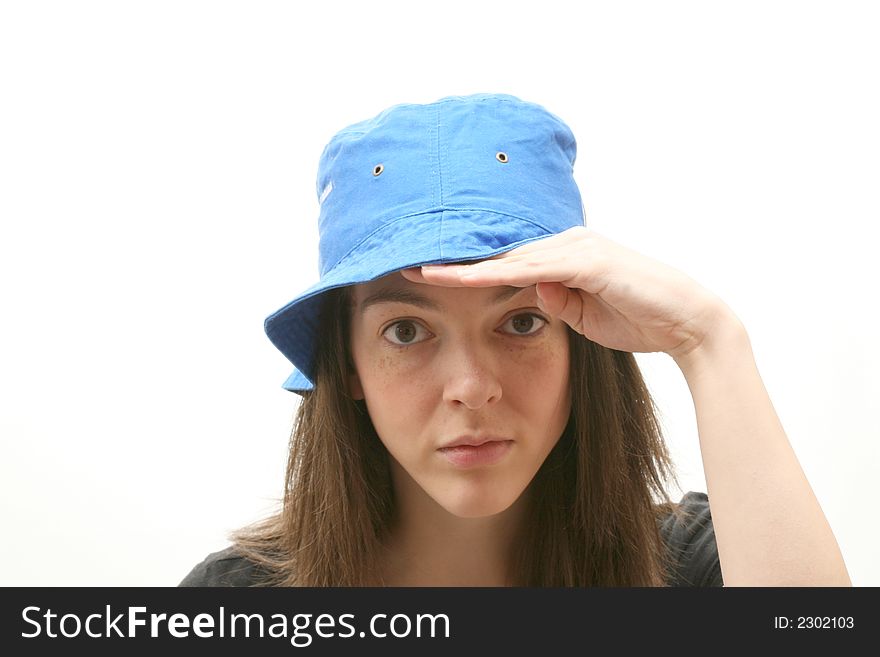 Young woman isolated over white background wearing a hat