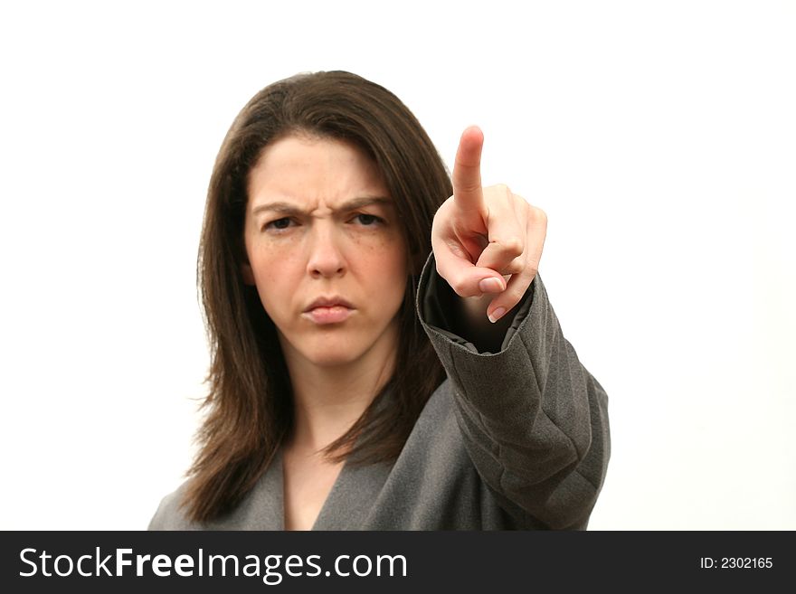 Frowning business woman with pointing finger