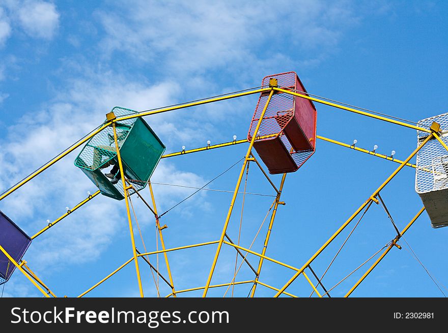 Ferris wheel at a fair. Ferris wheel at a fair