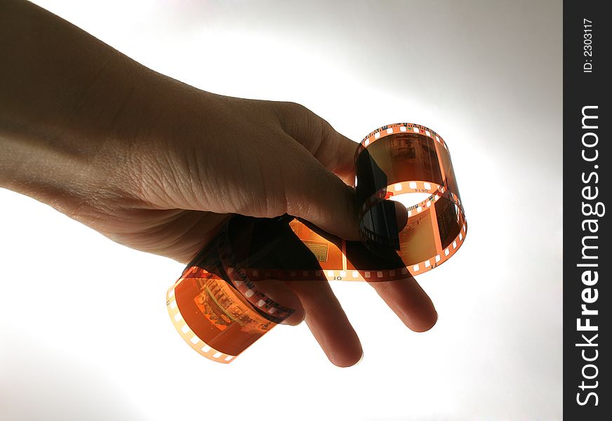 Film in a hand on light