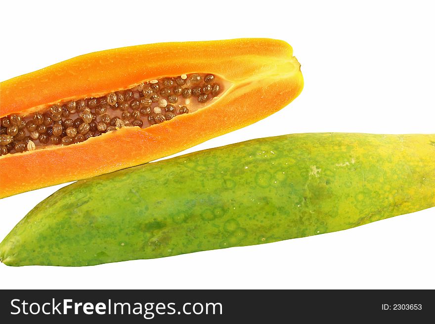 Cut papaya fruit showing seeds