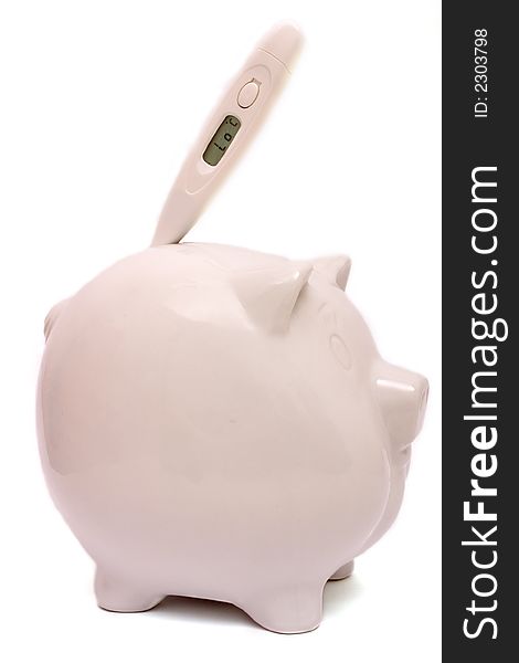 Piggybank with thermometer, indicating lo, reflecting low reserves and/or health care costs. See more conceptual pictures