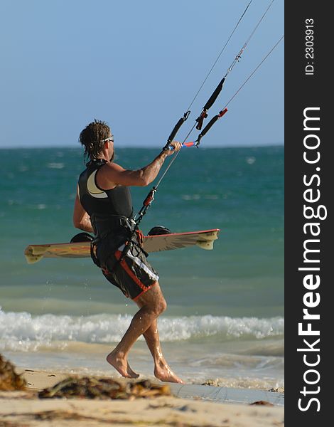 Kite Surfer On Beach