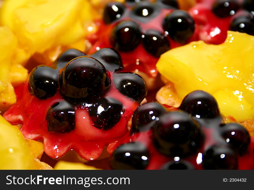 Many little colored tarts for dessert