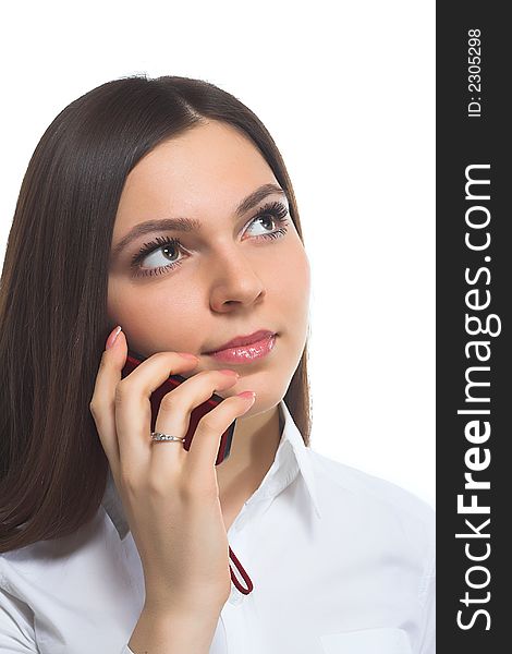 Attractive young woman calling by mobile phone. Isolated over white. Attractive young woman calling by mobile phone. Isolated over white
