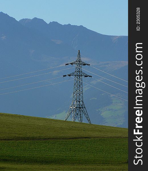 A tower for electricity cables in alpine environment. A tower for electricity cables in alpine environment