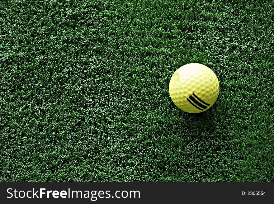 A view of a driving range with flags fluttering in the wind. A view of a driving range with flags fluttering in the wind