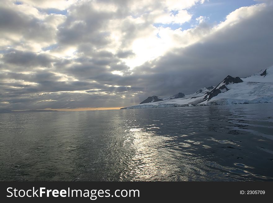 Antarctica sunset in a calm day