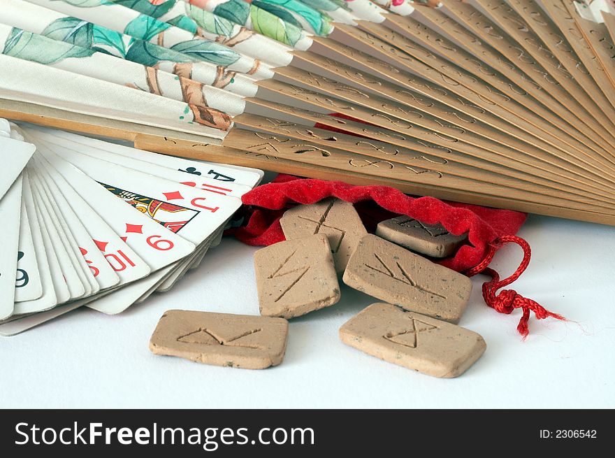 Fortune Teller's runes and cards with old flabellum