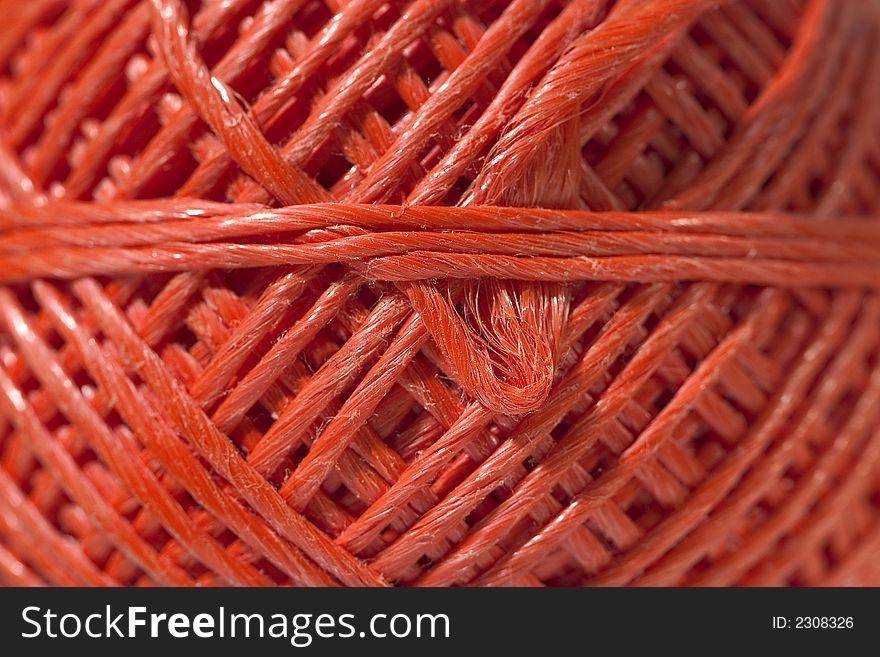 Close up of ball of orange string. Close up of ball of orange string