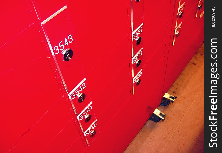 Red numbered mail boxes at local post office. Red numbered mail boxes at local post office