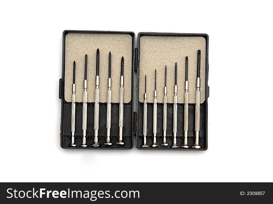 A set of precision screw drivers in a toolbox. A set of precision screw drivers in a toolbox