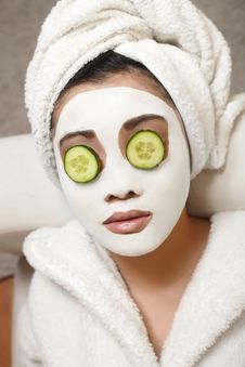Chinese Woman With Cucumbers And Mask Stock Photo Chinese Woman With Cucumbers And Mask Stock Photo