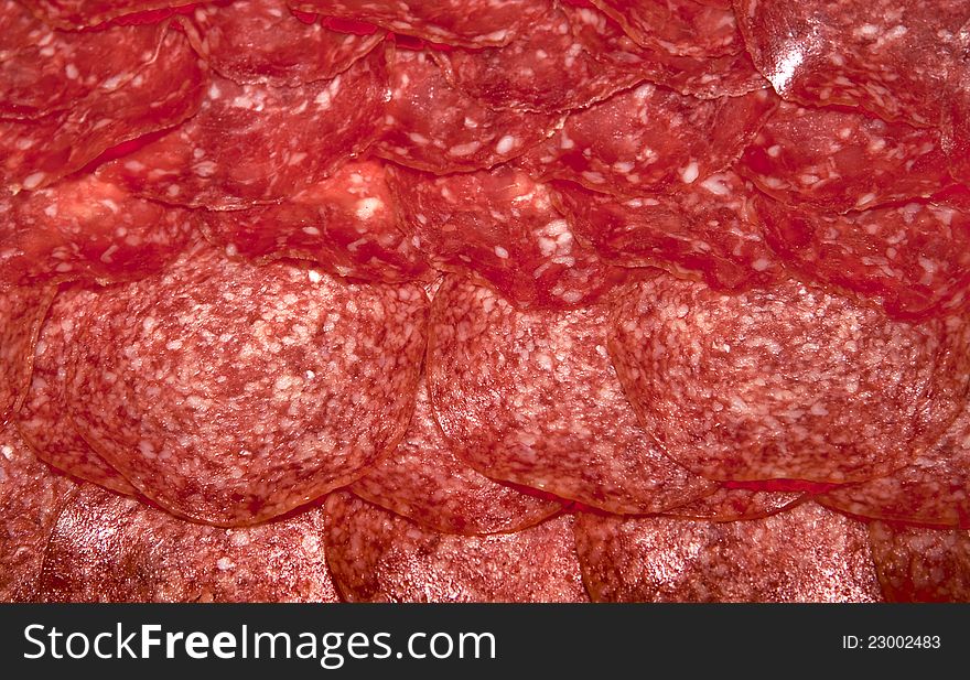 Spicy salami sliced fine - gurman background. Spicy salami sliced fine - gurman background