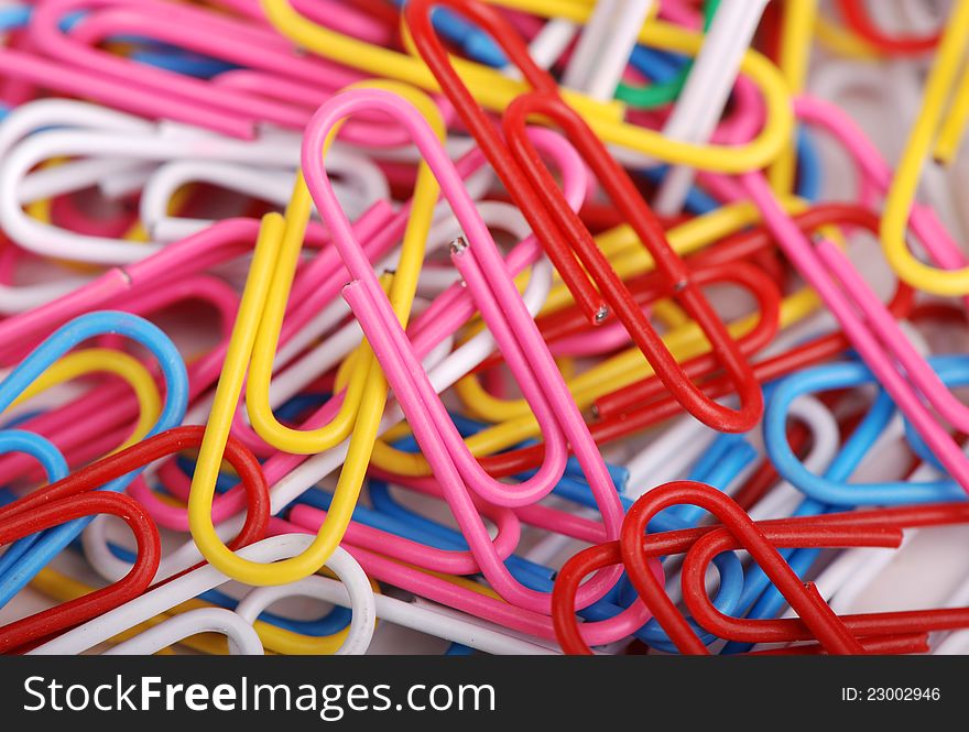 Studio photo of a pile of color clips as a background. Studio photo of a pile of color clips as a background