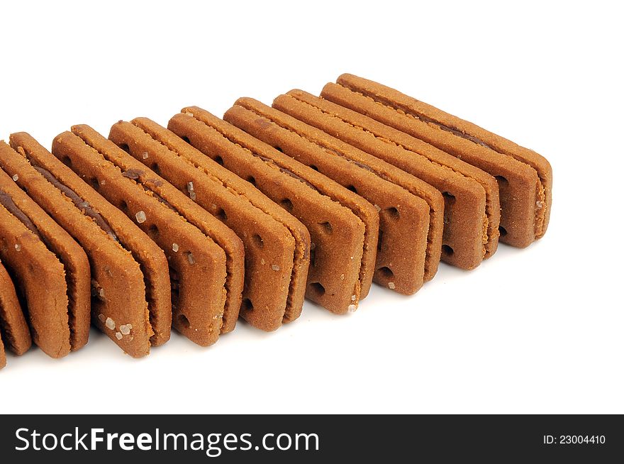 Chocolate cream biscuits on white background. Chocolate cream biscuits on white background