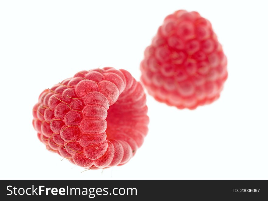 Raspberries on the white clean background