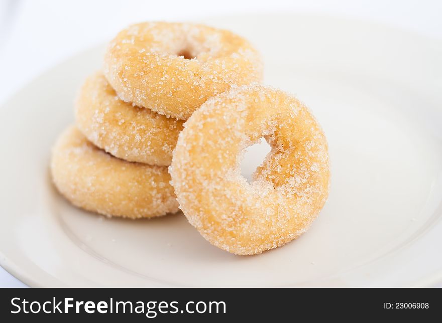 4 donuts on white plate. 4 donuts on white plate