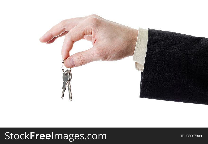 Hand of businessman holding set of keys isolated on white. Hand of businessman holding set of keys isolated on white