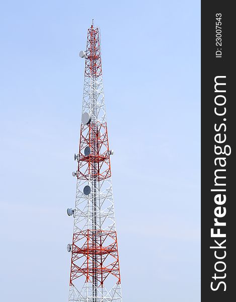 Mobile phone mast antenna on blue sky background