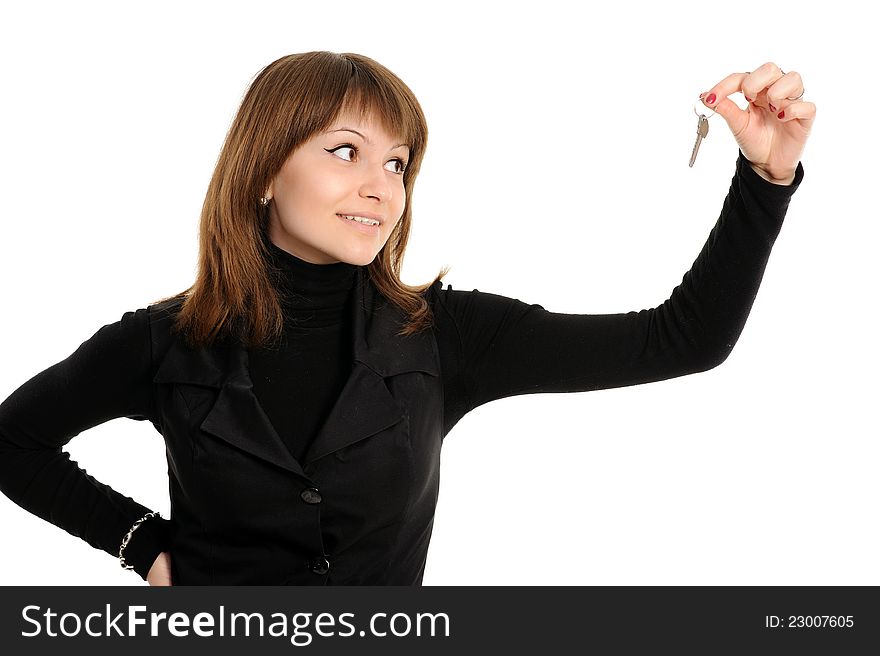 Portrait of charming young woman holding keys isolated over white background. Portrait of charming young woman holding keys isolated over white background