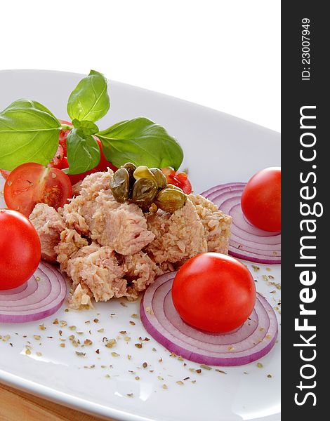Plate composition whit tuna salad tomato end onion. Plate composition whit tuna salad tomato end onion