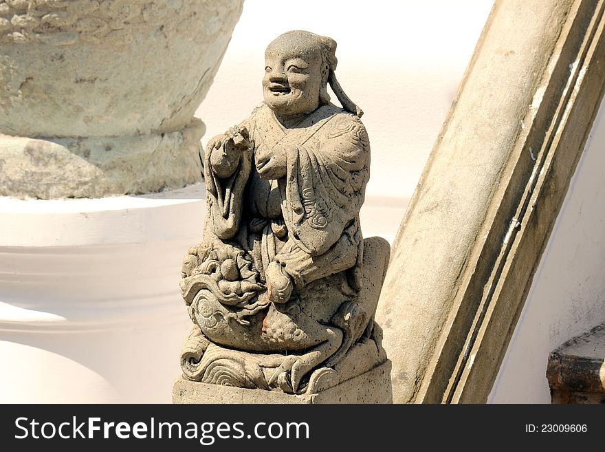 Chinese doll stucco in temple Thailand