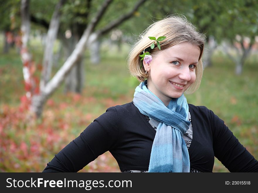 Smiling Girl In The Garden