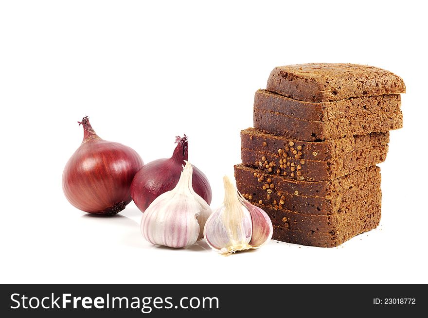 Fresh black dieting bread with garlic and onion on a white background