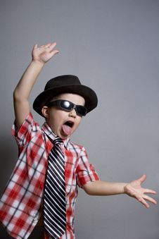 The Boy In A Hat And Black Glasses Royalty Free Stock Image The Boy In A Hat And Black Glasses Royalty Free Stock Image