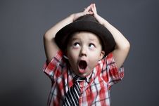 The Boy In A Hat On A Gray Background Stock Images The Boy In A Hat On A Gray Background Stock Images