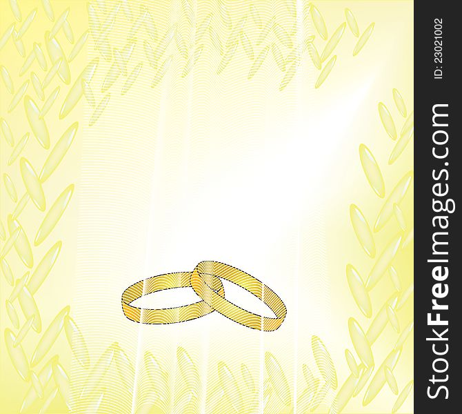 Wedding rings on the yellow background