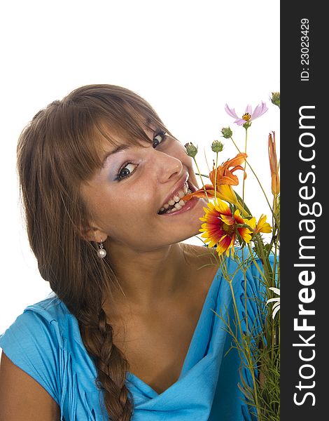 Beautiful girl holds a bunch of flowers, isolated. Beautiful girl holds a bunch of flowers, isolated