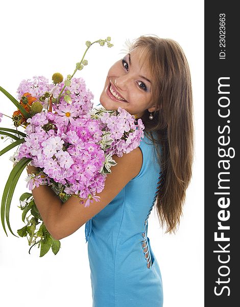 Beautiful girl holds a bunch of flowers, isolated. Beautiful girl holds a bunch of flowers, isolated