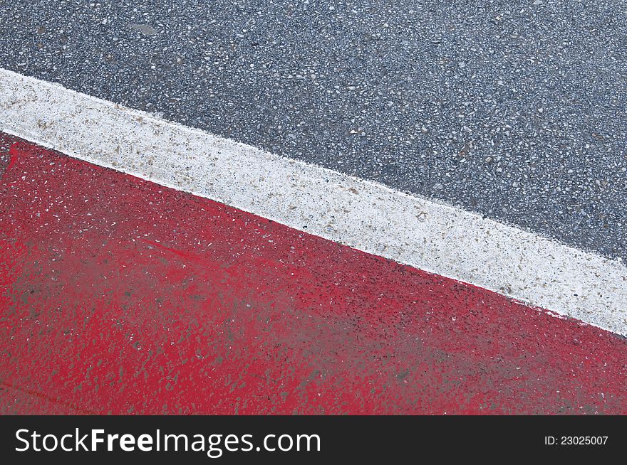 Abstract pattern on the side of a road