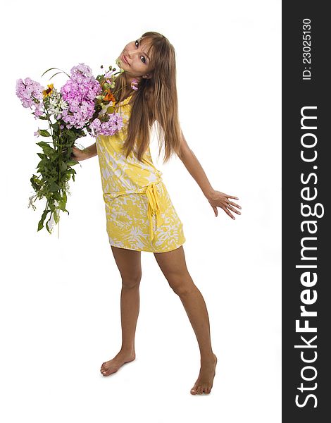 Beautiful girl holds a bunch of flowers, isolated. Beautiful girl holds a bunch of flowers, isolated