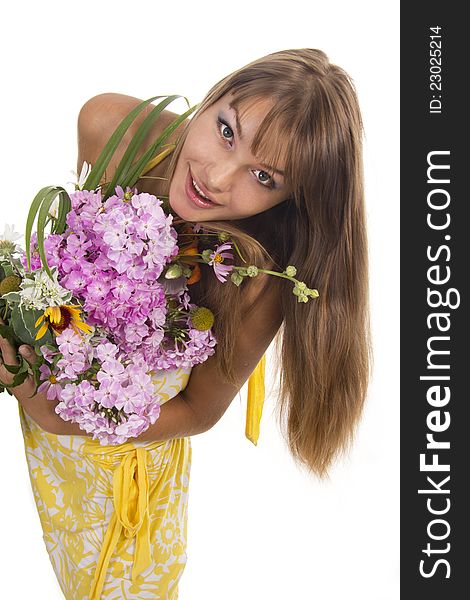 Beautiful girl holds a bunch of flowers, isolated. Beautiful girl holds a bunch of flowers, isolated