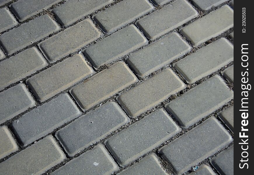 A detail of interlocking pavement. A detail of interlocking pavement