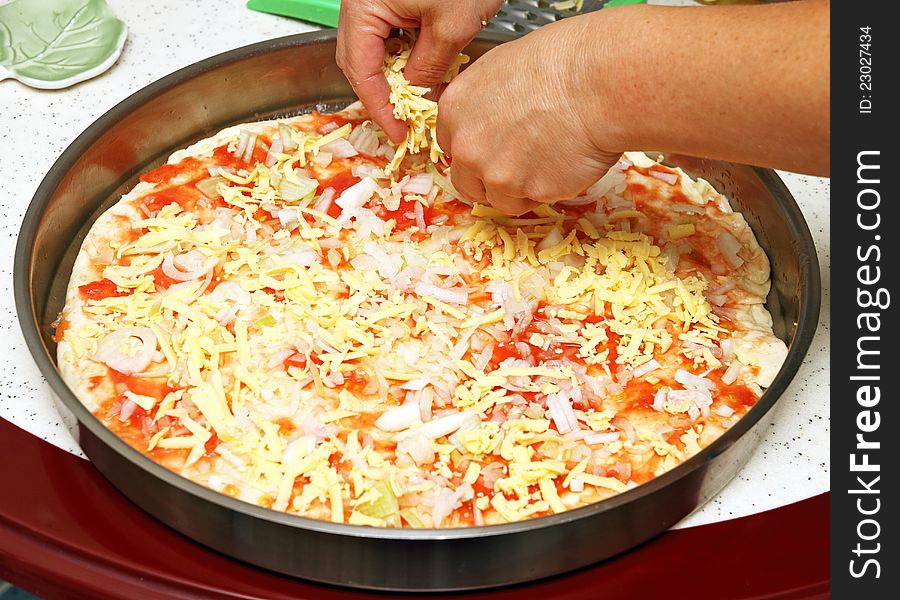 Preparing home made pizza image