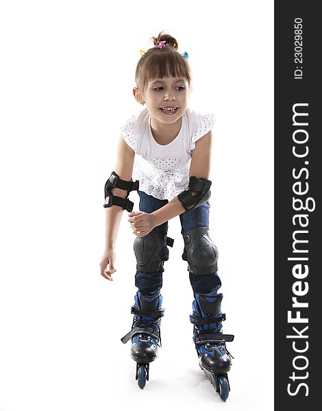 The little girl on roller skates. white