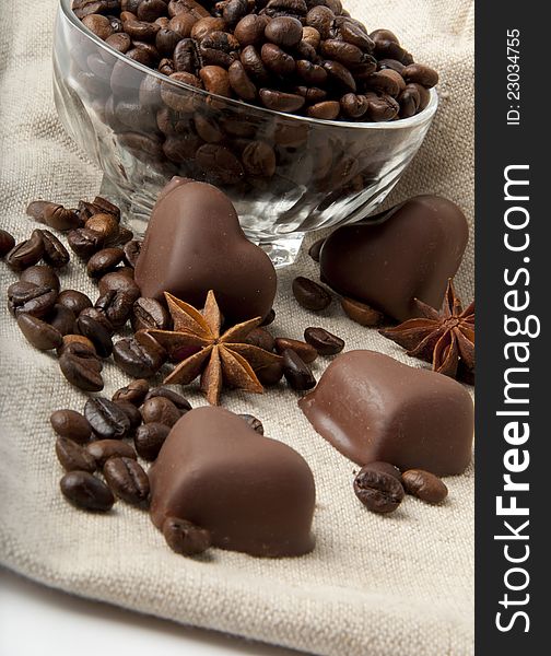 Coffee beans and chocolate heart