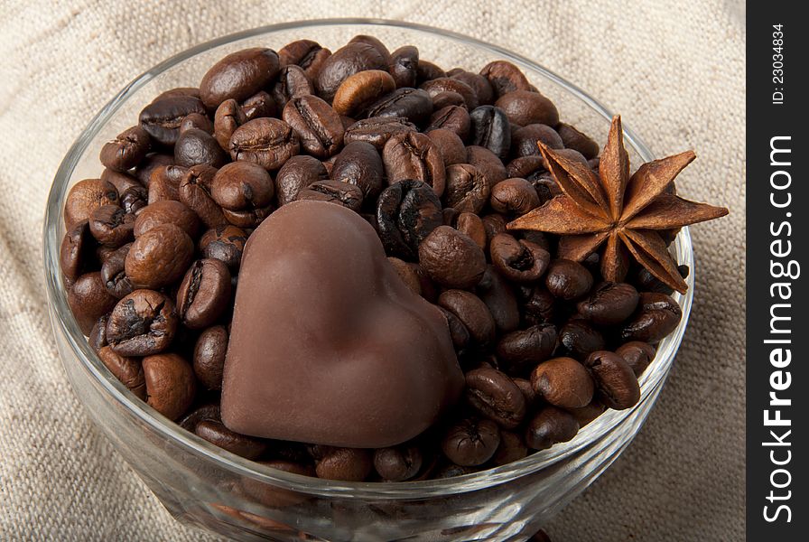 Coffee beans and chocolate heart. Coffee beans and chocolate heart