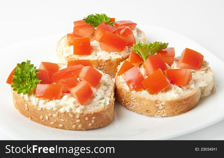 Appetizers with tomatoes and cream cheese