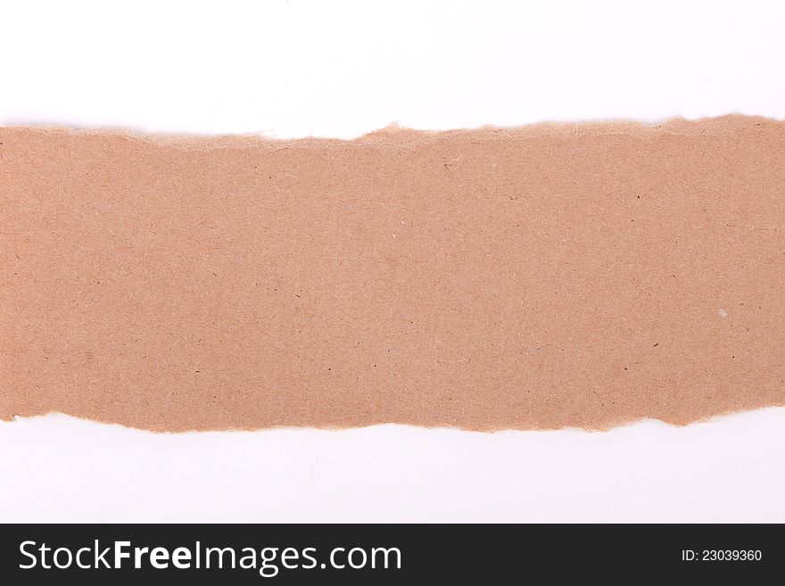 Ripped brown paper on white background